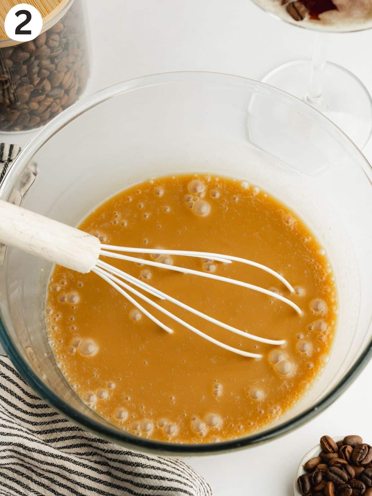 coffee liquor, vodka, and vegan condensed milk whisked in a small bowl.