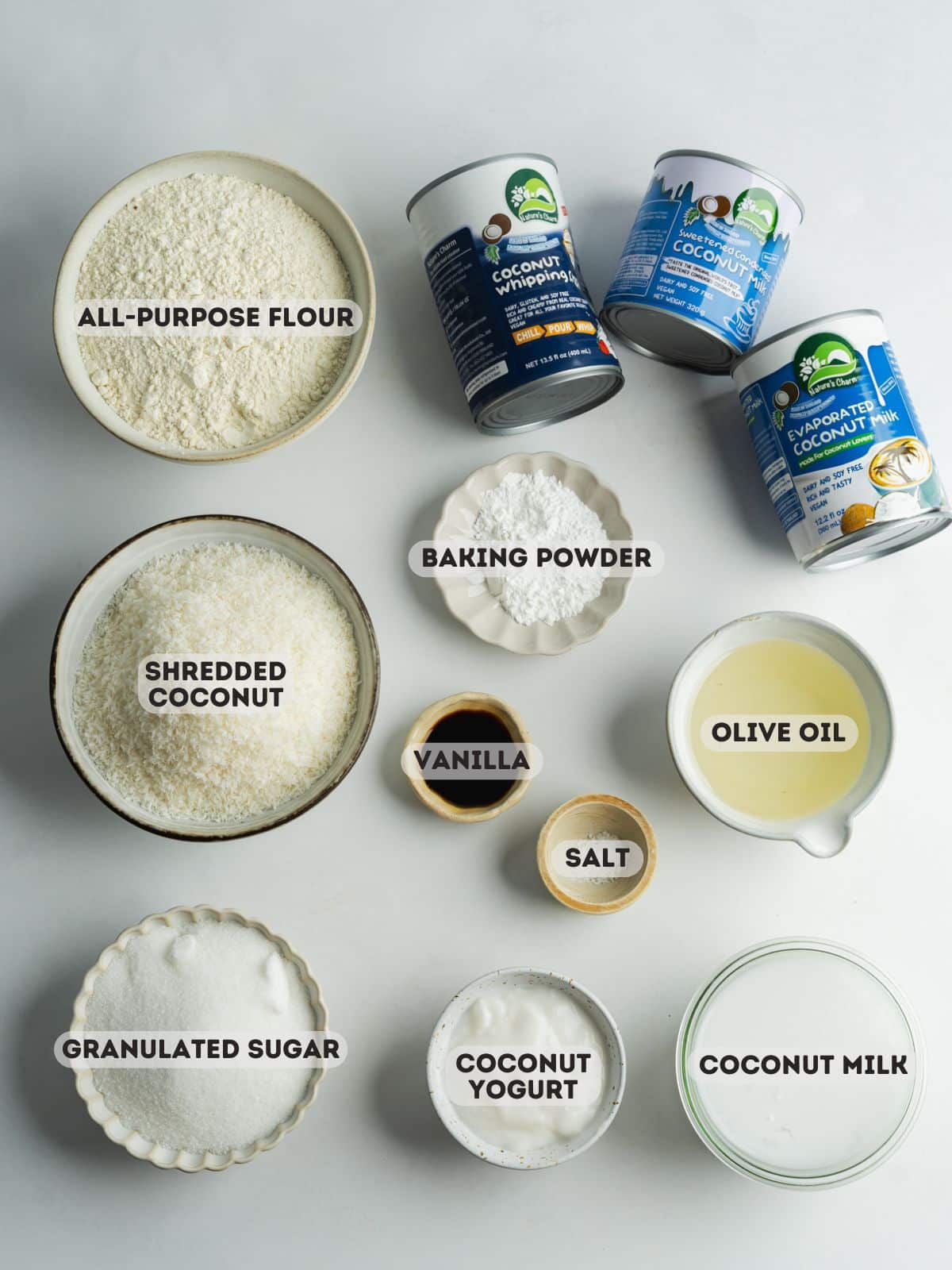 ingredients for coconut tres leches measured out in bowls.