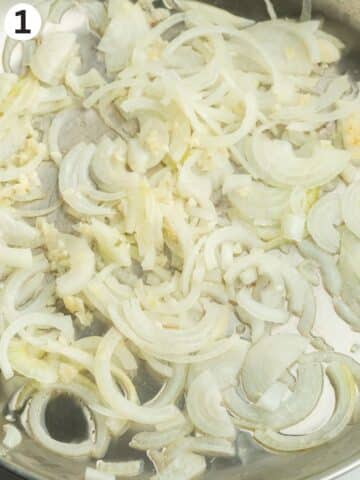 finely sliced white onion sauteeing in a saucepan.