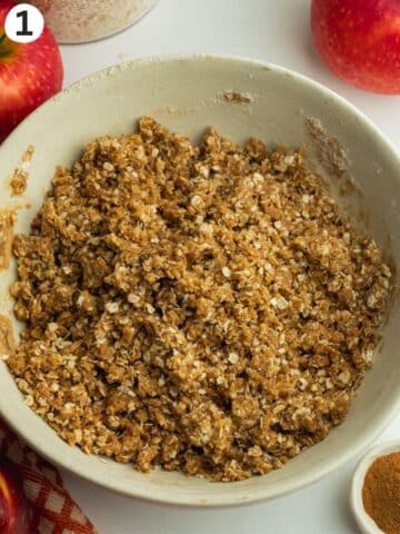 oaty crisp topping in a ceramic bowl.