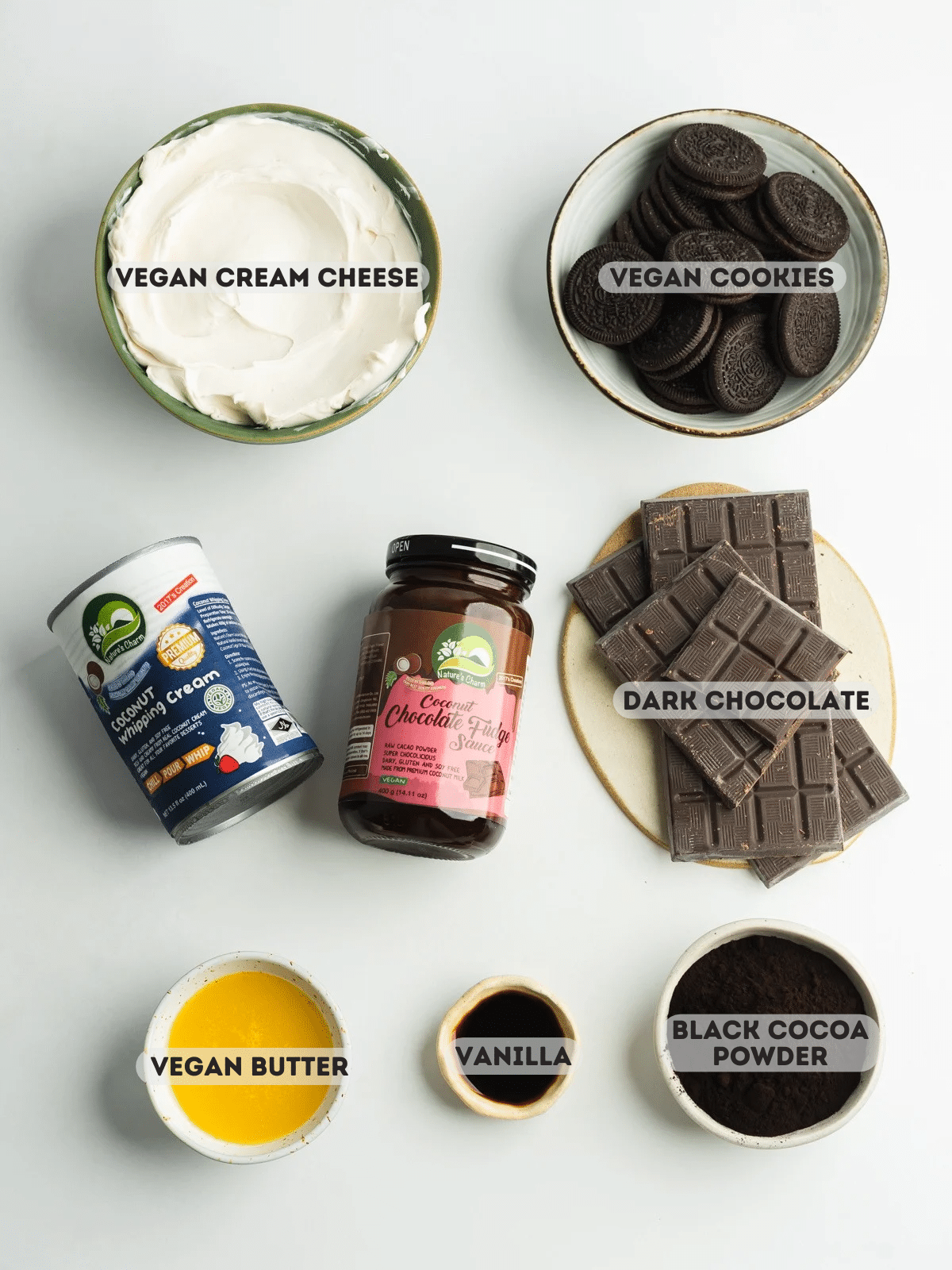 ingredients for dark chocolate cheesecake measured out in bowls.